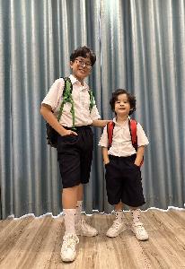 Đồng phục học sinh tiểu học trắng váy xanh ngọc