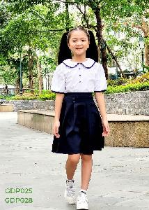 Mẫu đồng phục lớp tiểu học xanh ngọc váy quần kem