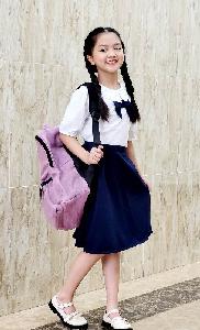 Áo thun cổ sơ mi cam cho học sinh tiểu học