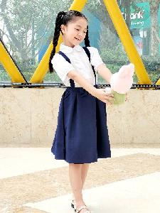 Đồng phục học sinh tiểu học vàng phối xanh đen