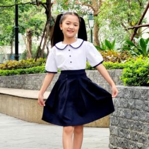 Chân váy bé gái xếp li xòe đính 4 nút đồng phục học sinh nữ