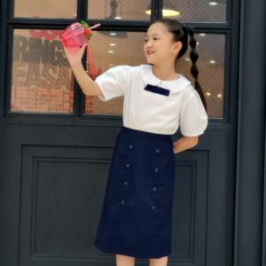 Chân váy bé gái chữ A rã ba mảnh đính nút đồng phục học sinh nữ